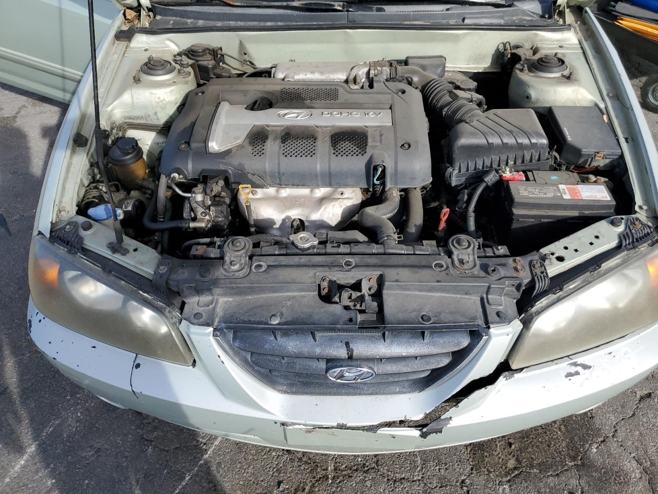 2004 Hyundai Elantra VIN KMHDN46DX4U909524 Copart auction photo, side / front end damage thumbnail 13