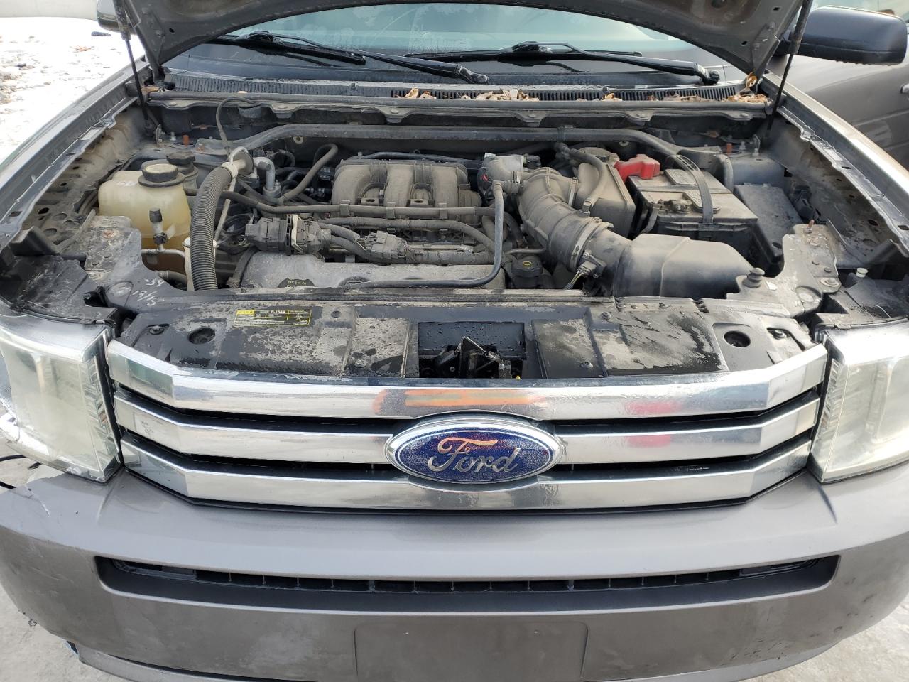 2009 Ford Flex VIN 2FMDK51C69BA14140 Copart auction photo, front end / rear end damage thumbnail 12