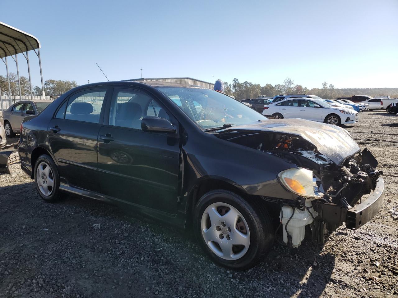 2003 Toyota Corolla VIN 1NXBR32E43Z122703 Copart auction photo, front end / minor dent/scratches damage thumbnail 4