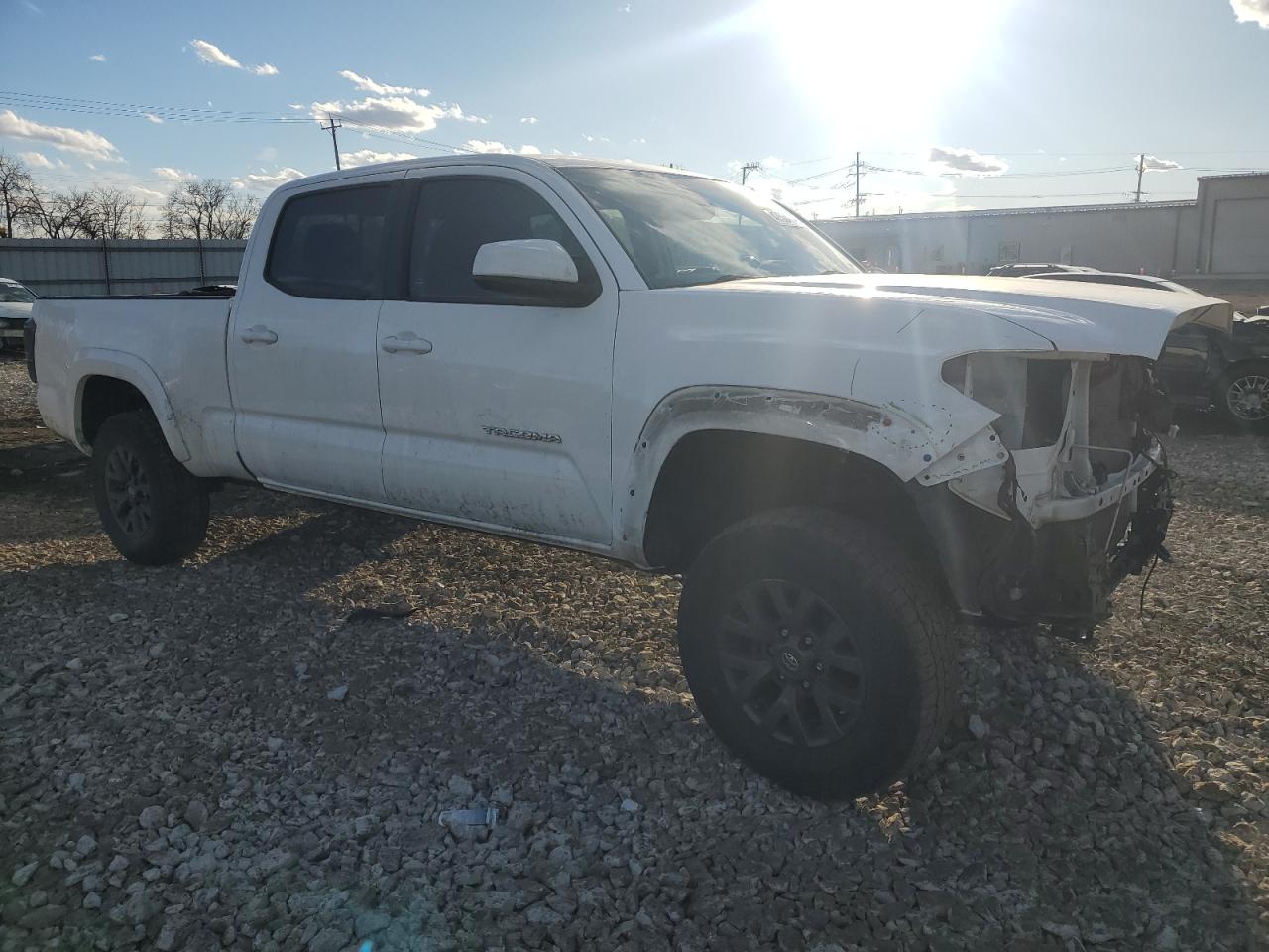 2021 Toyota Tacoma VIN 3TMDZ5BN0MM101524 Copart auction photo, rear end / front end damage thumbnail 4