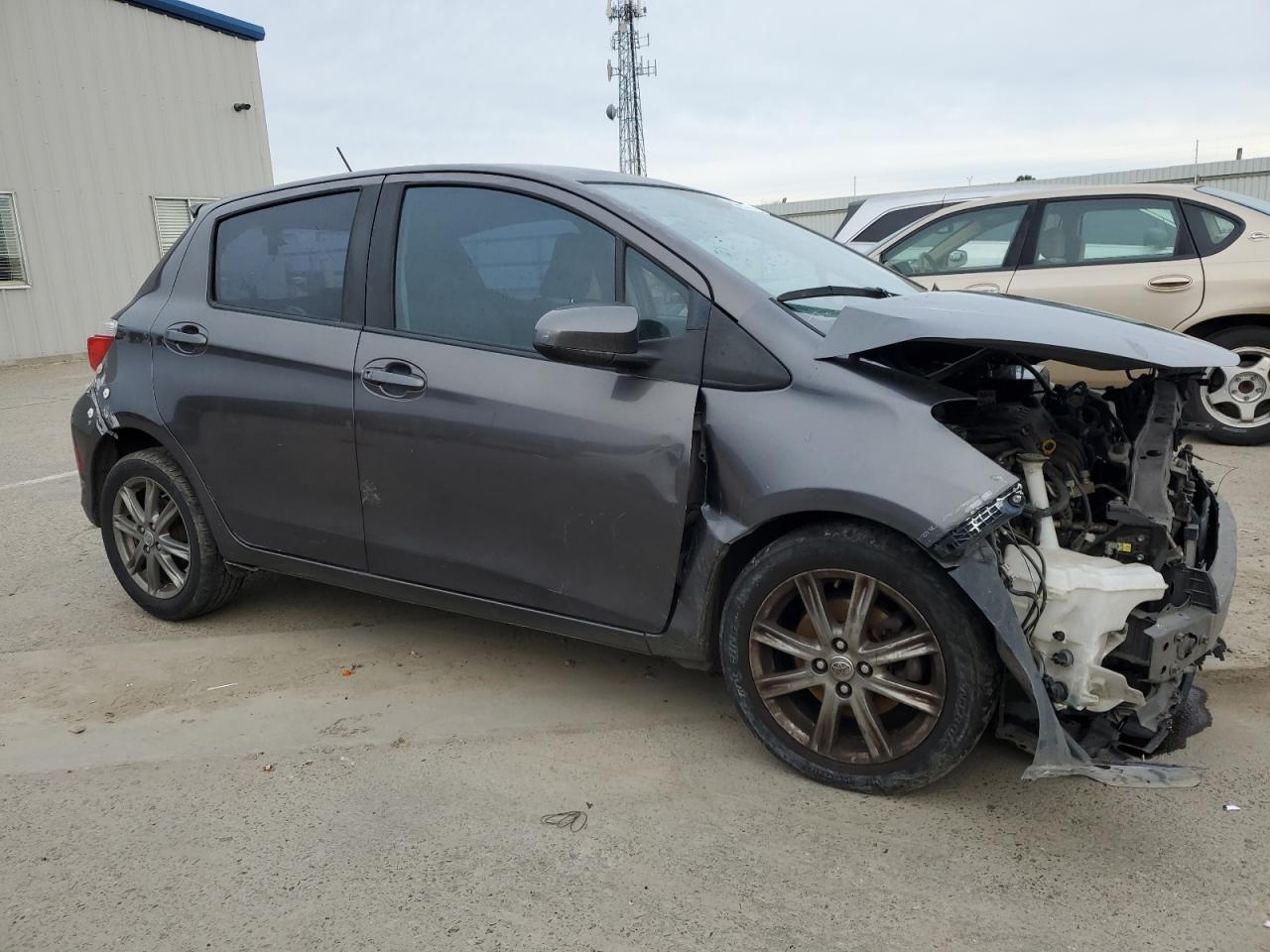 2012 Toyota Yaris VIN JTDKTUD3XCD506671 Copart auction photo, front end / rear end damage thumbnail 4