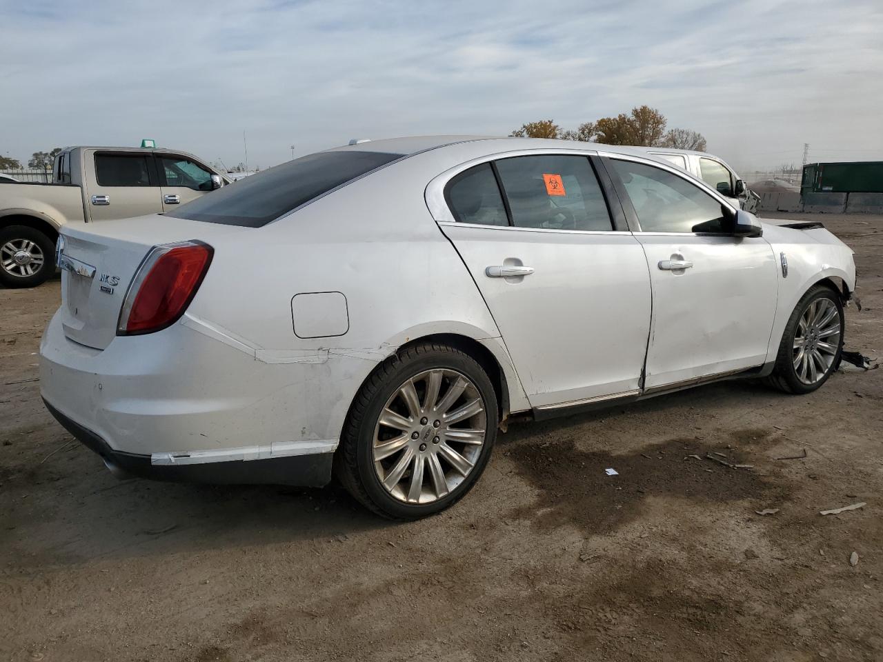 2012 Lincoln MKS VIN 1LNHL9ER0CG806966 Copart auction photo, front end / minor dent/scratches damage thumbnail 3