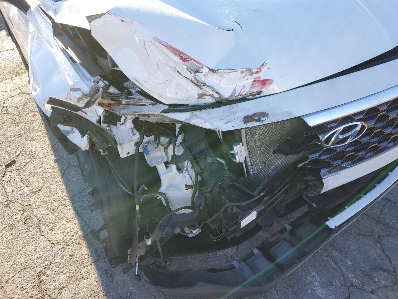 2020 Hyundai Santa Fe VIN 5NMS3CAD0LH281174 Copart auction photo, front end / side damage thumbnail 12