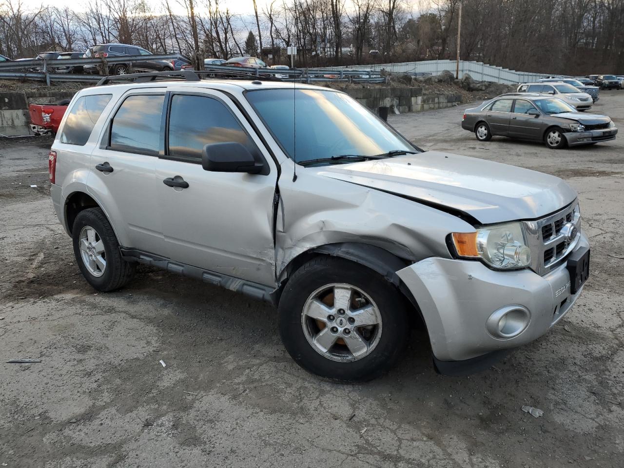 2009 Ford Escape VIN 1FMCU93789KA19410 Copart auction photo, side / front end damage thumbnail 4