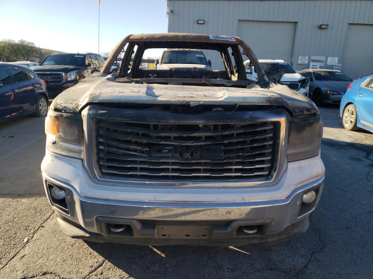 2015 GMC Sierra VIN 3GTU2VEC5FG327901 Copart auction photo, burn damage thumbnail 5