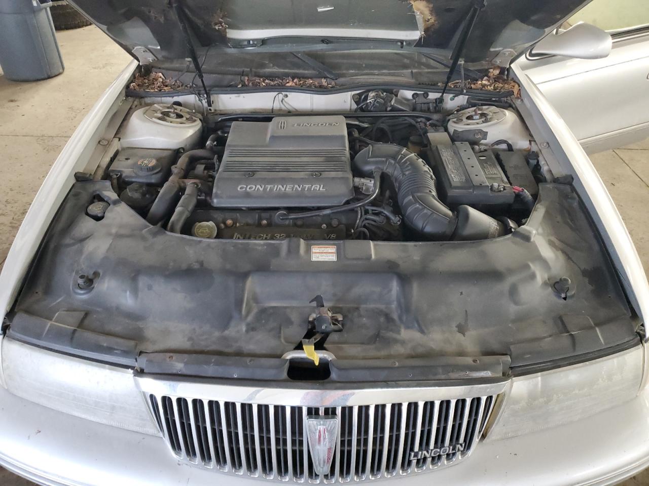 1997 Lincoln Continental VIN 1LNLM97V0VY672751 Copart auction photo, side damage thumbnail 11