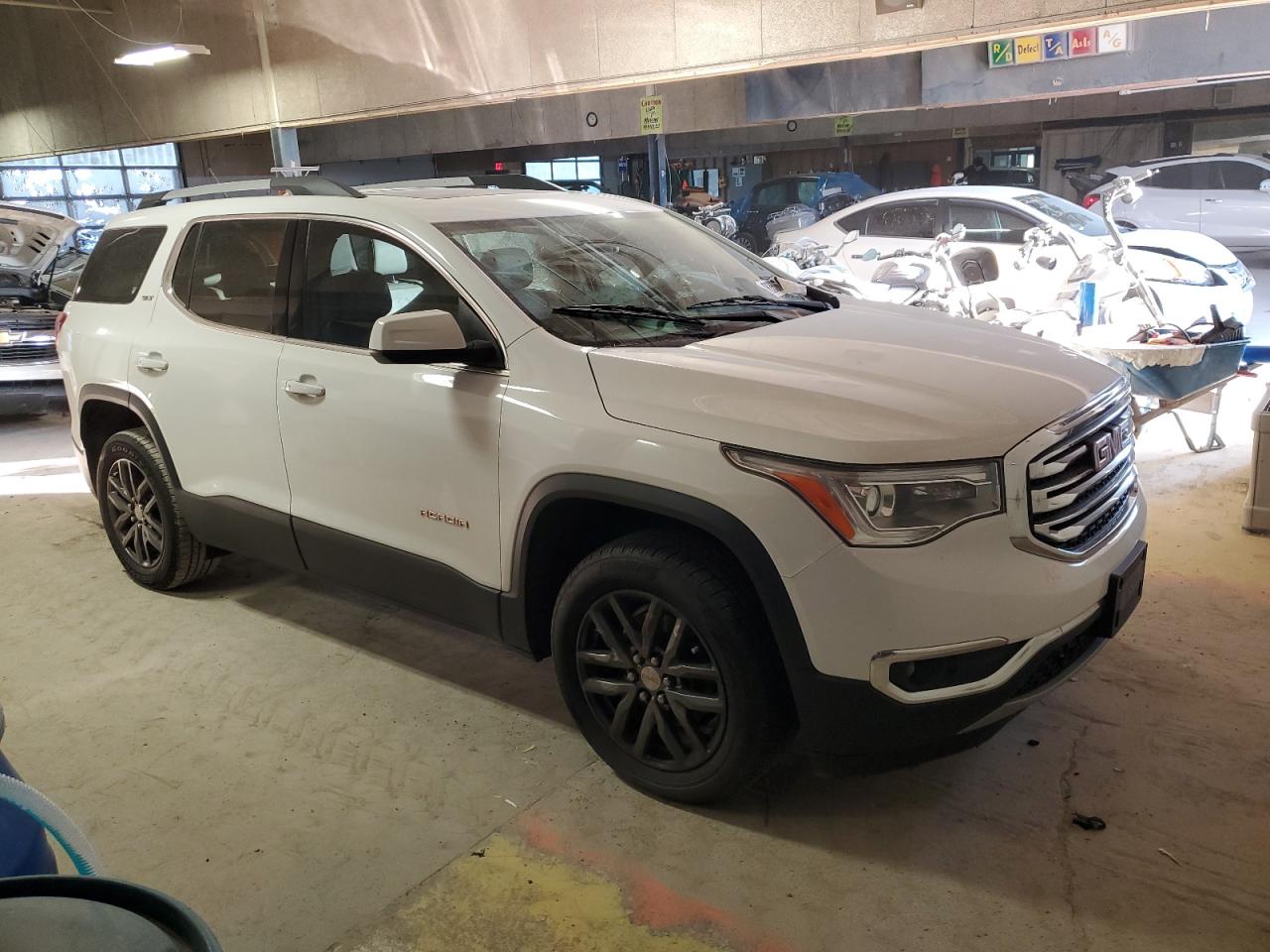 2017 GMC Acadia VIN 1GKKNMLS6HZ143903 Copart auction photo, minor dent/scratches damage thumbnail 4