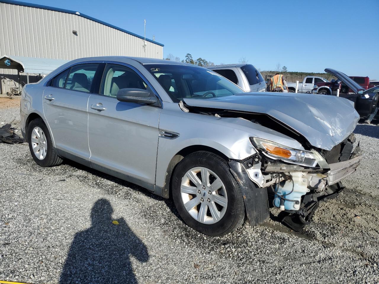 2010 Ford Taurus VIN 1FAHP2DW6AG111918 Copart auction photo, front end damage thumbnail 4
