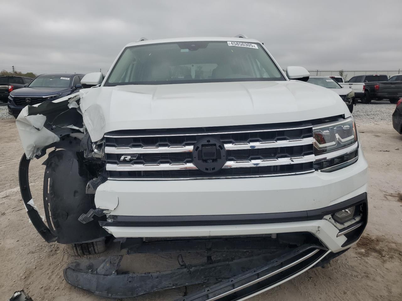 2019 Volkswagen Atlas VIN 1V2YR2CA7KC603214 Copart auction photo, front end / side damage thumbnail 5