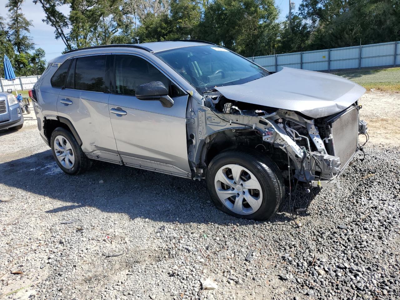 2021 Toyota RAV 4 VIN JTMH1RFV1MD061265 Copart auction photo, all over damage thumbnail 4