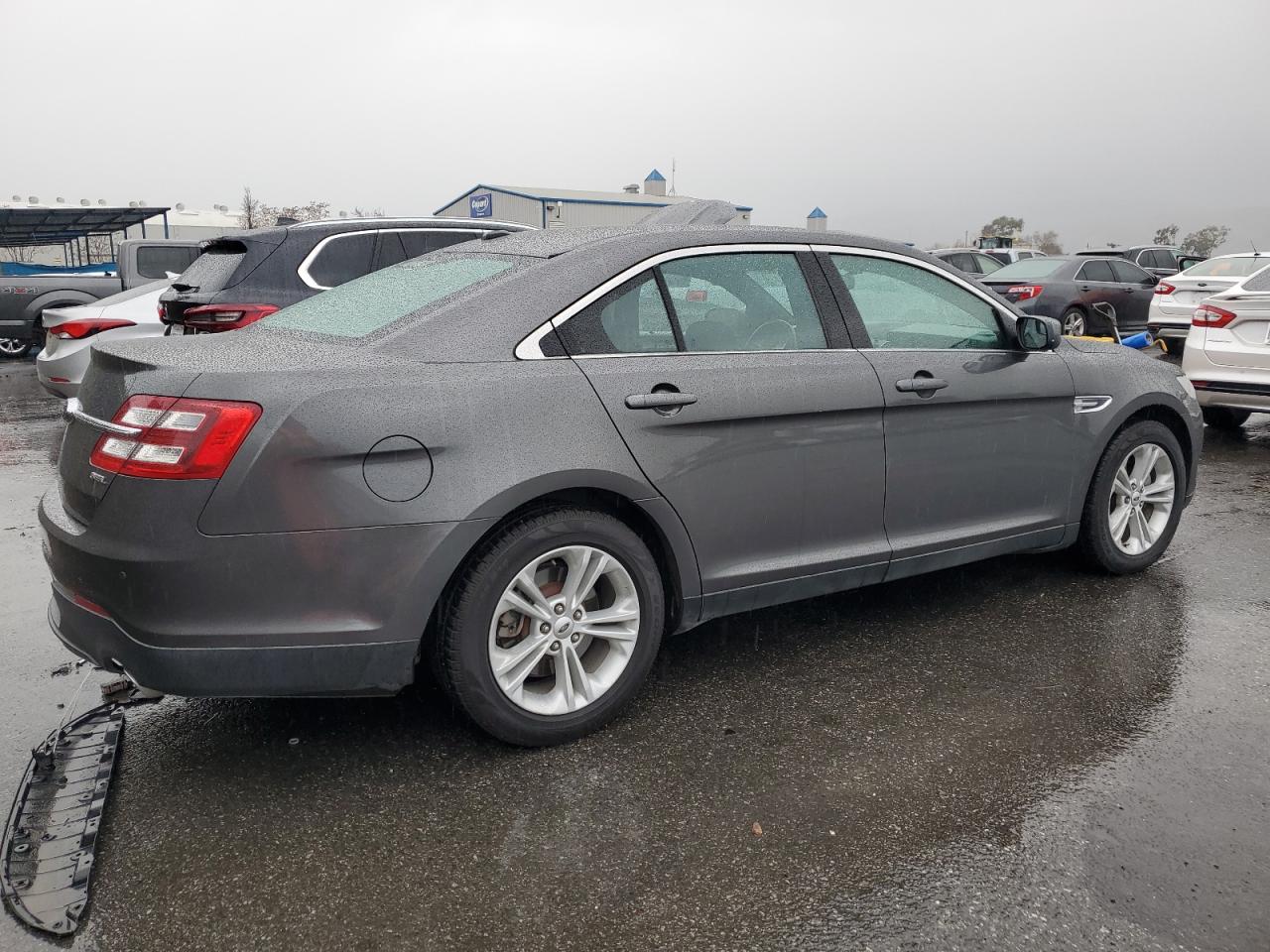 2015 Ford Taurus VIN 1FAHP2E87FG188739 Copart auction photo, undercarriage damage thumbnail 3