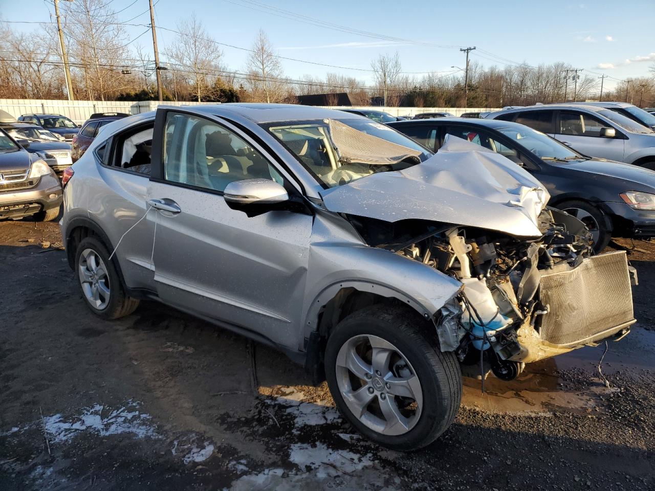 2016 Honda HR-V VIN 3CZRU6H58GM748916 Copart auction photo, front end / side damage thumbnail 4
