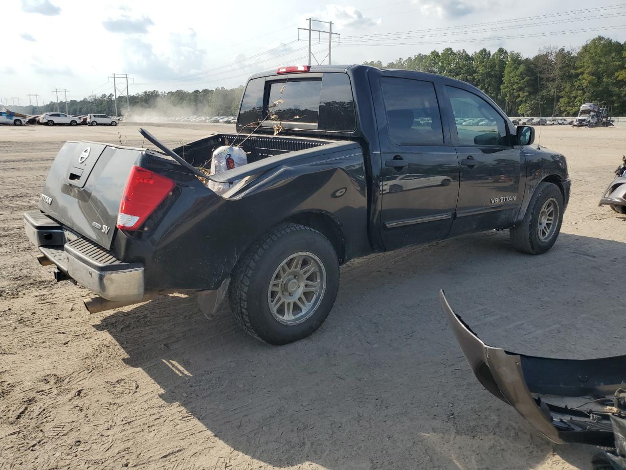 2011 Nissan Titan VIN 1N6BA0ED1BN311392 Copart auction photo, side / rear end damage thumbnail 3