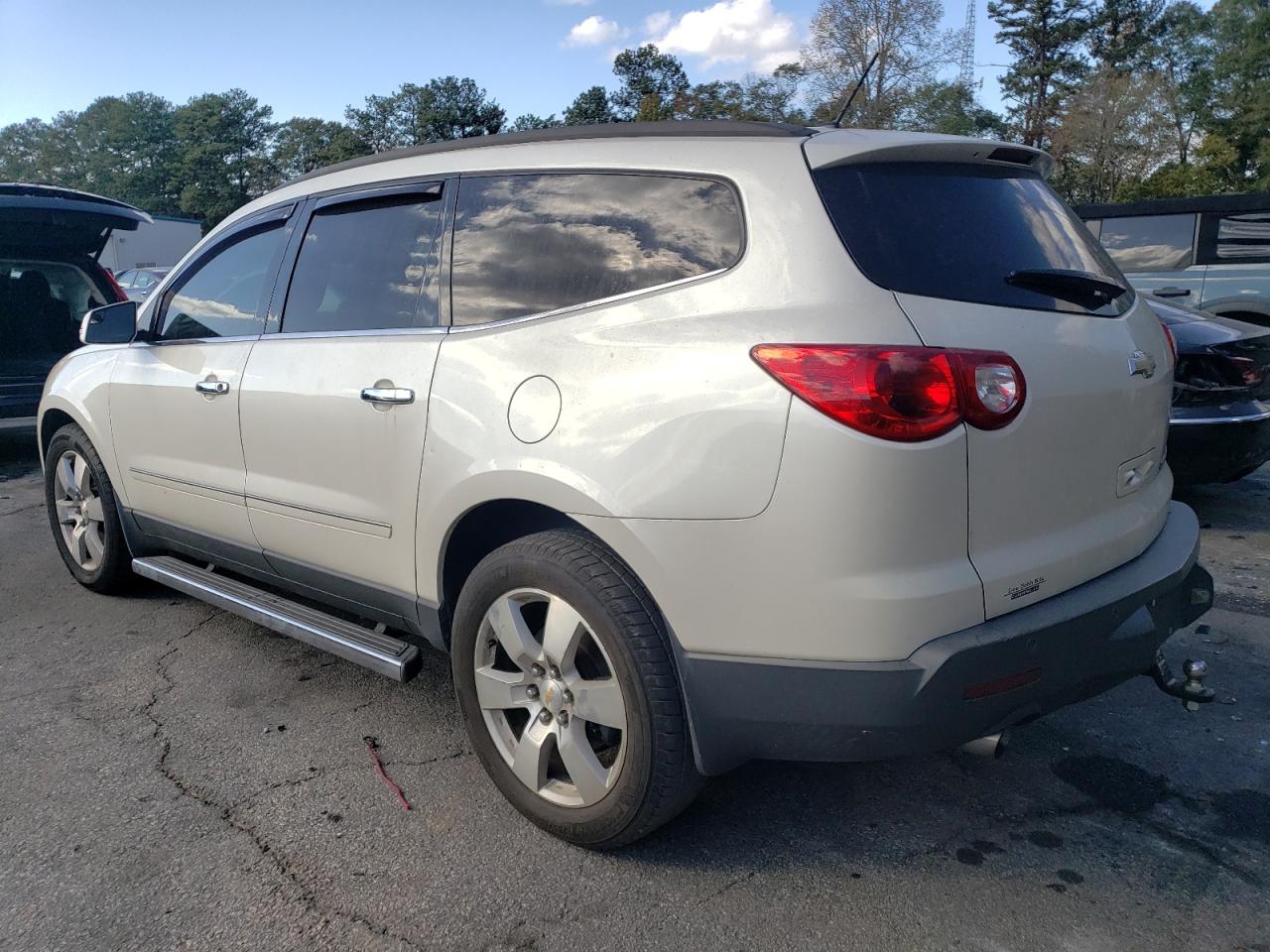 2011 Chevrolet Traverse VIN 1GNKRLED2BJ294887 Copart auction photo, burn - engine damage thumbnail 2