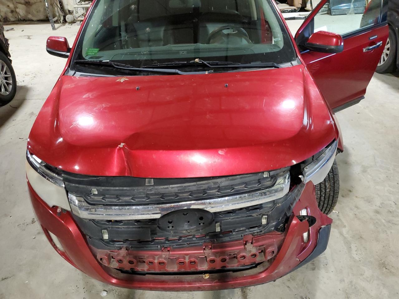 2011 Ford Edge VIN 2FMDK4JCXBBB34488 Copart auction photo, front end / minor dent/scratches damage thumbnail 14