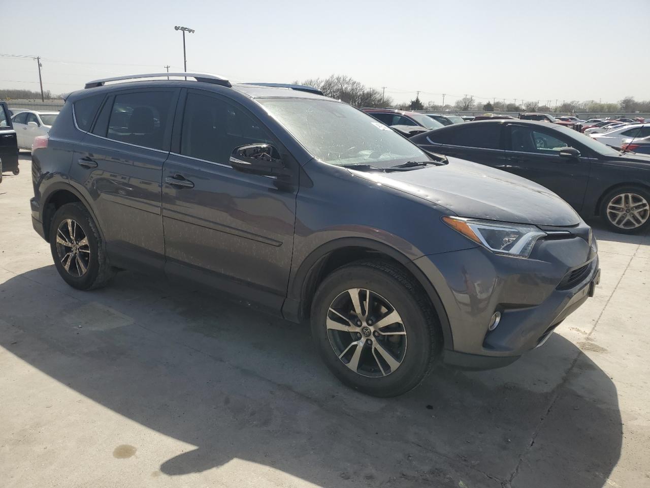 2016 Toyota RAV 4 VIN JTMWFREV1GD088965 Copart auction photo, hail damage thumbnail 4