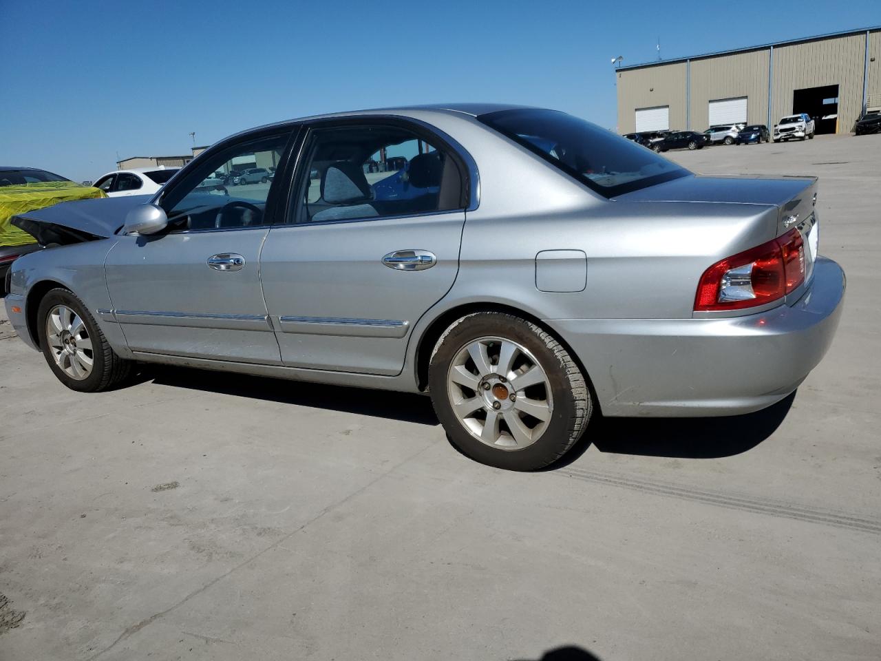 2005 KIA Optima VIN KNAGD128055433689 Copart auction photo, front end damage thumbnail 2