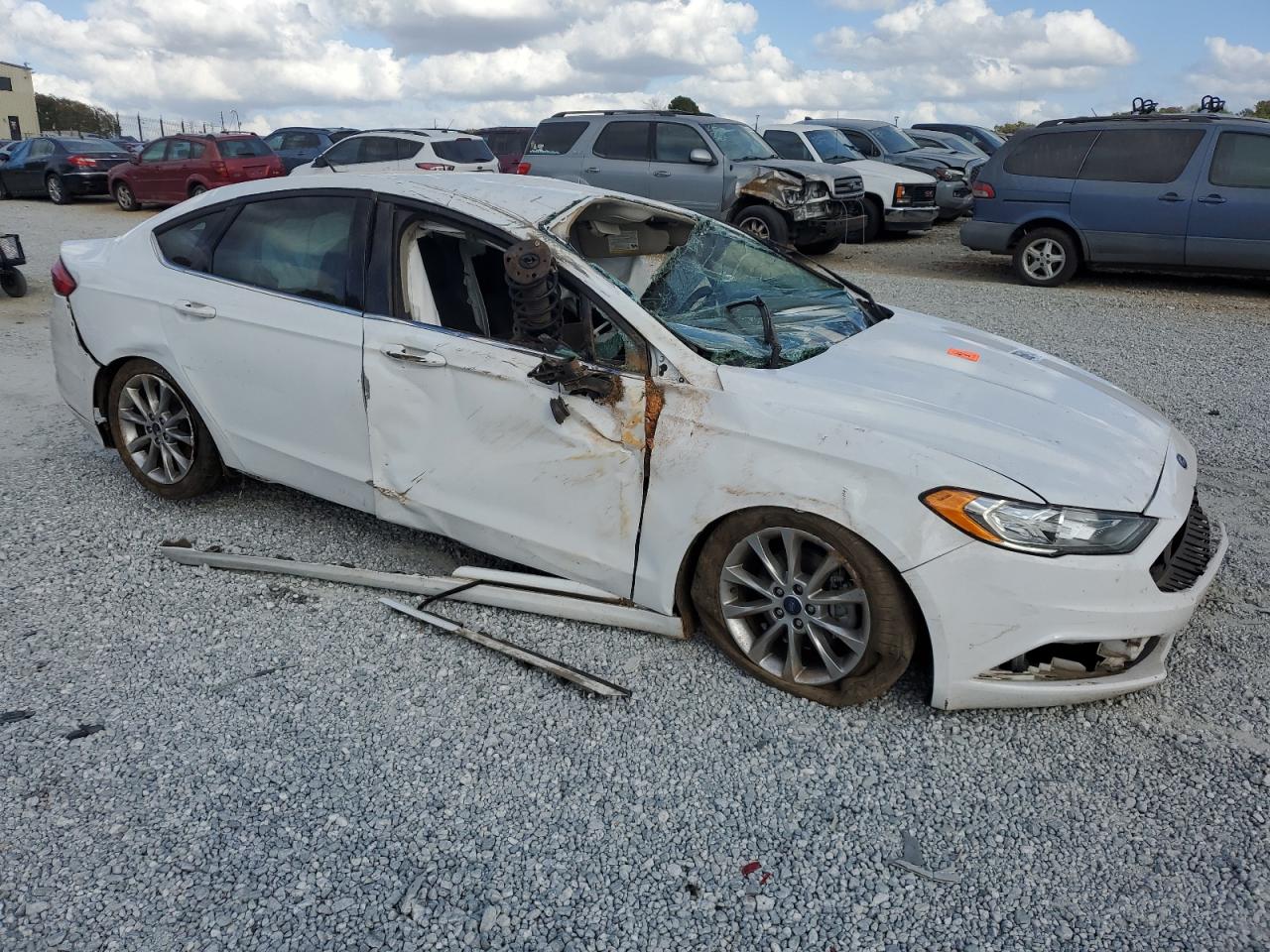 2017 Ford Fusion VIN 3FA6P0H79HR355709 Copart auction photo, rollover damage thumbnail 4