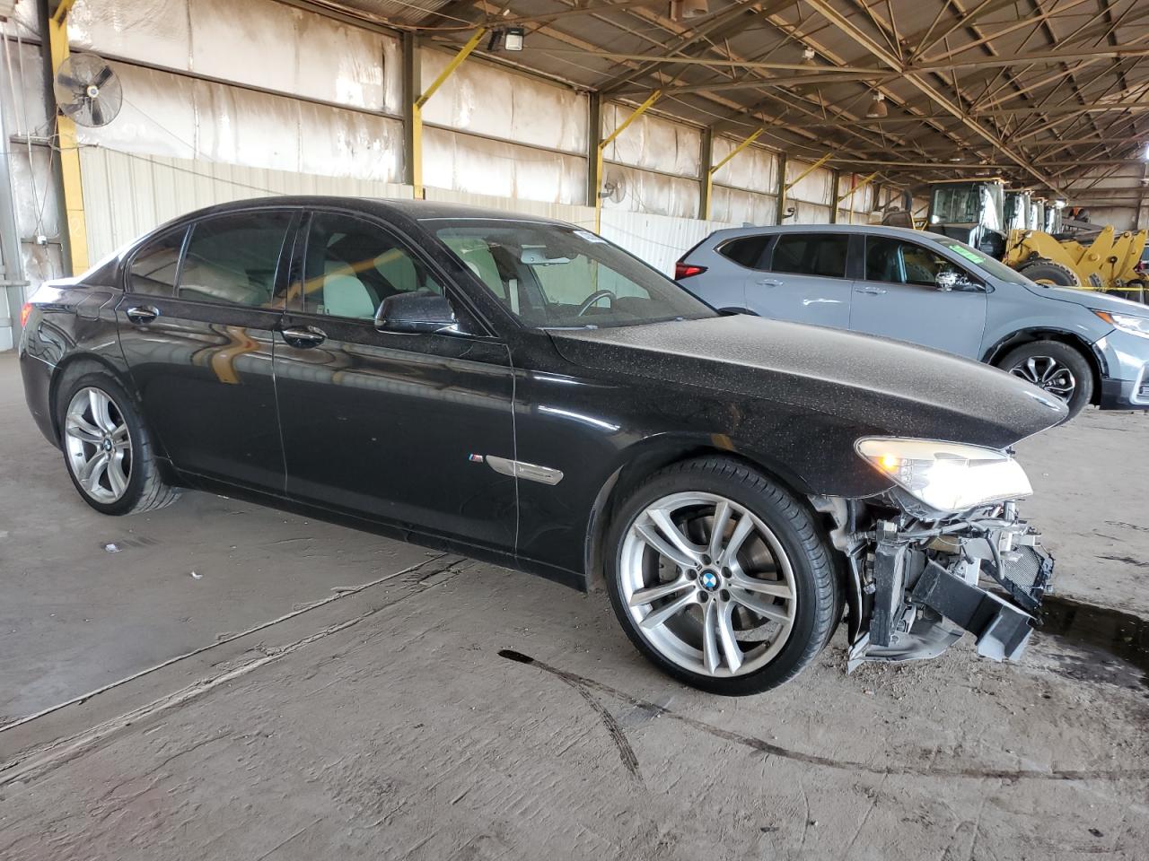 2011 BMW 7er VIN WBAKA4C50BC613240 Copart auction photo, front end damage thumbnail 4