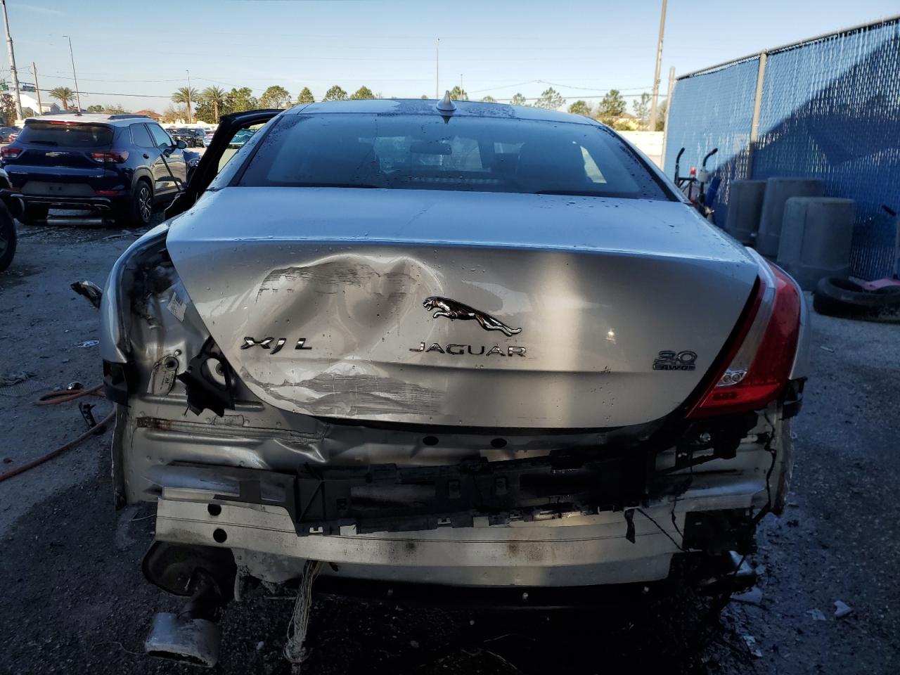 2015 Jaguar XJ VIN SAJWJ2GD9F8V81151 Copart auction photo, side / rear end damage thumbnail 6
