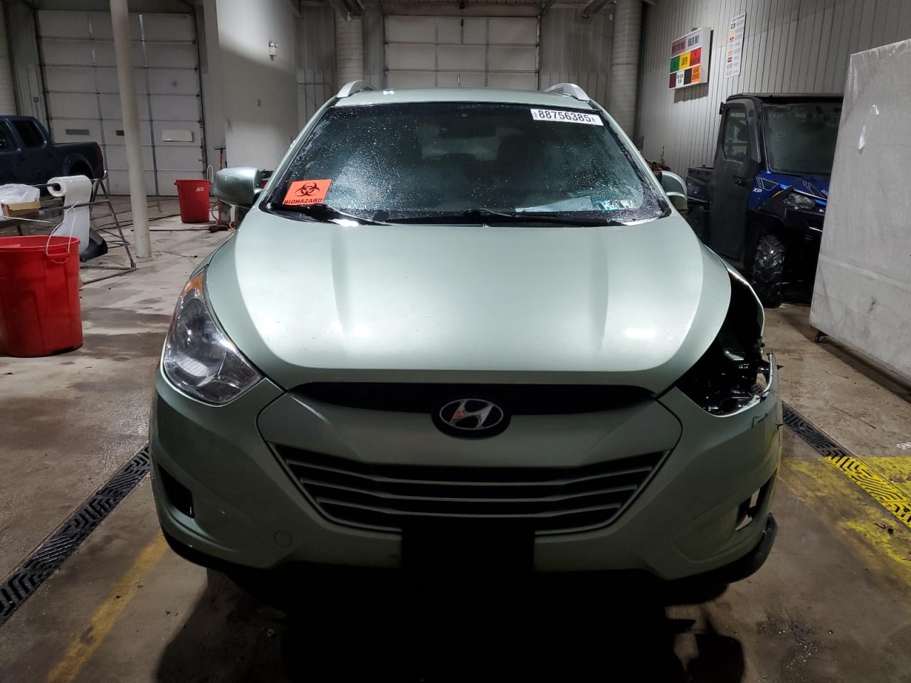 2010 Hyundai Tucson VIN KM8JUCAC7AU022795 Copart auction photo, front end damage thumbnail 5