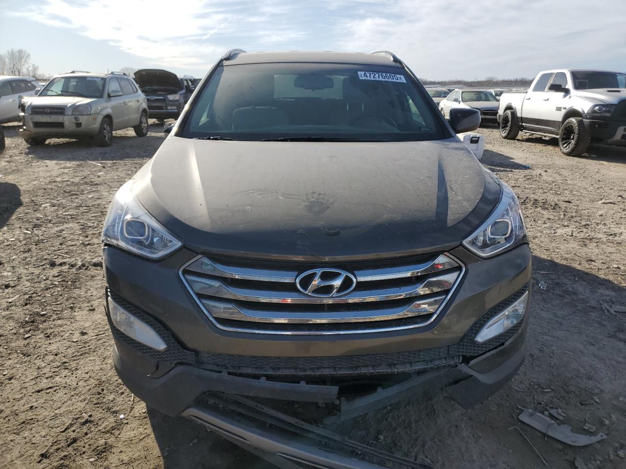 2014 Hyundai Santa Fe VIN 5XYZU3LB2EG186040 Copart auction photo, front end / vandalism damage thumbnail 5