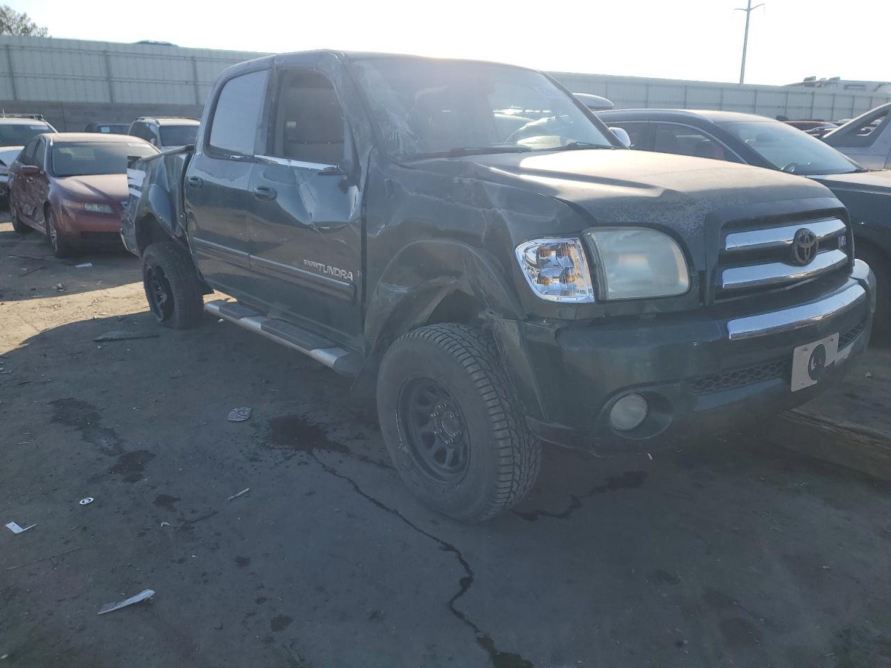 2004 Toyota Tundra VIN 5TBDT44154S446210 Copart auction photo, front end / rear end damage thumbnail 4