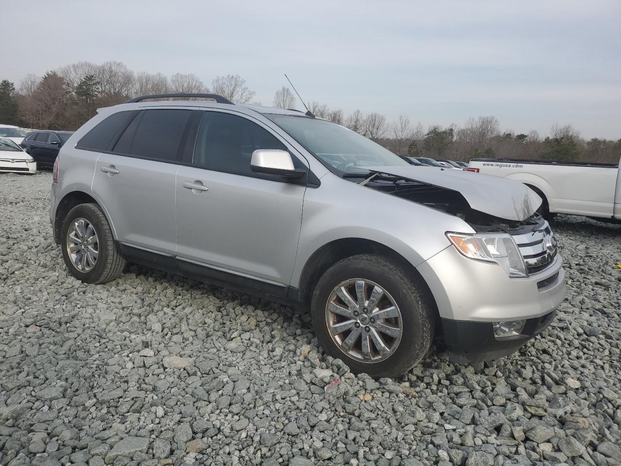 2010 Ford Edge VIN 2FMDK3JC2ABA95744 Copart auction photo, front end / minor dent/scratches damage thumbnail 4
