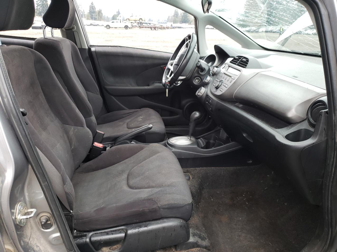 2010 Honda Fit VIN JHMGE8H40AS015608 Copart auction photo, all over damage thumbnail 7