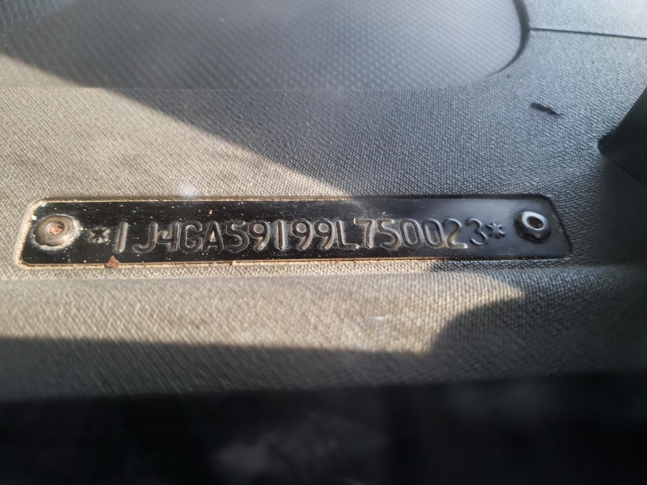 2009 Jeep Wrangler VIN 1J4GA59199L750023 Copart auction photo, minor dent/scratches damage thumbnail 12