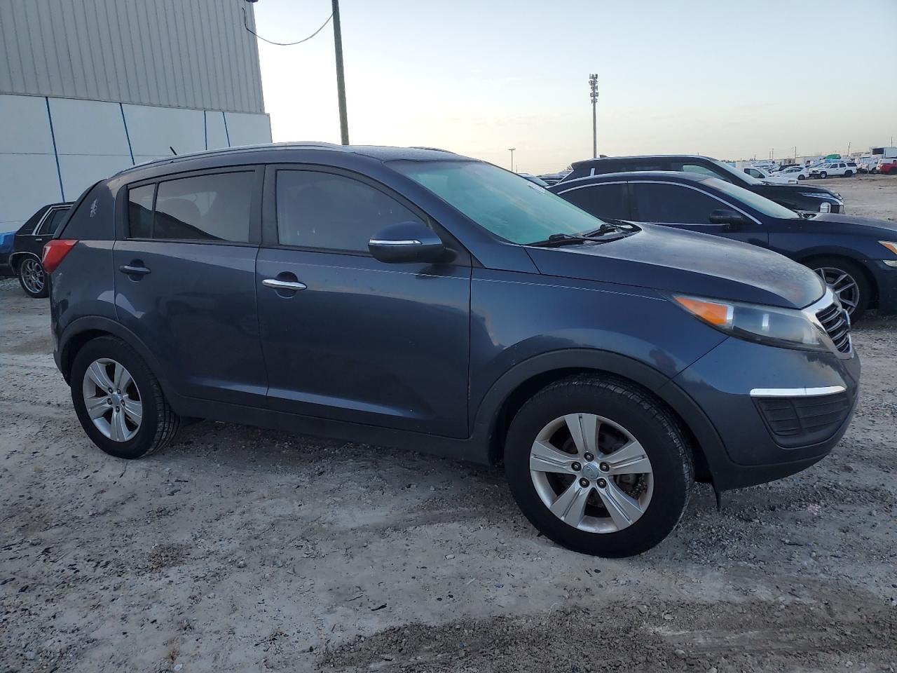 2011 KIA Sportage VIN KNDPB3A27B7029242 Copart auction photo, water/flood / rear end damage thumbnail 4