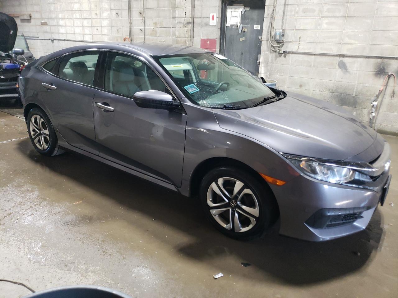 2016 Honda Civic VIN 2HGFC2F50GH540973 Copart auction photo, rear end / side damage thumbnail 4