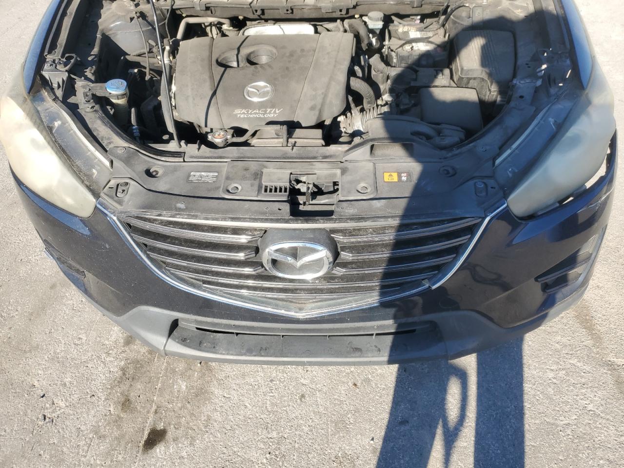 2016 Mazda CX-5 VIN JM3KE2BYXG0633938 Copart auction photo, front end / rear end damage thumbnail 12