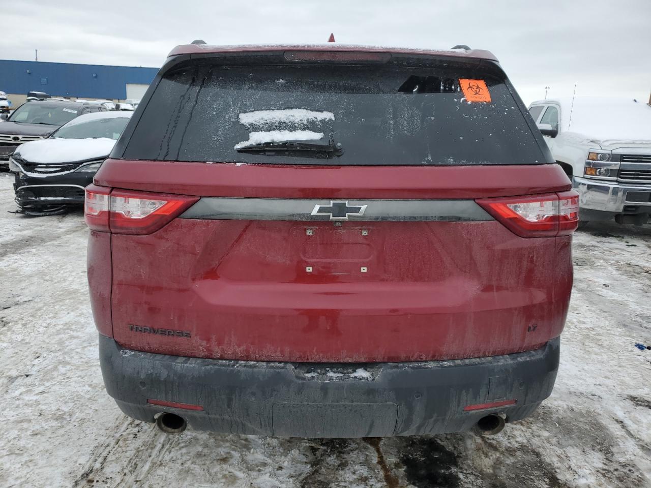 2021 Chevrolet Traverse VIN 1GNERGKW7MJ107382 Copart auction photo, front end / all over damage thumbnail 6