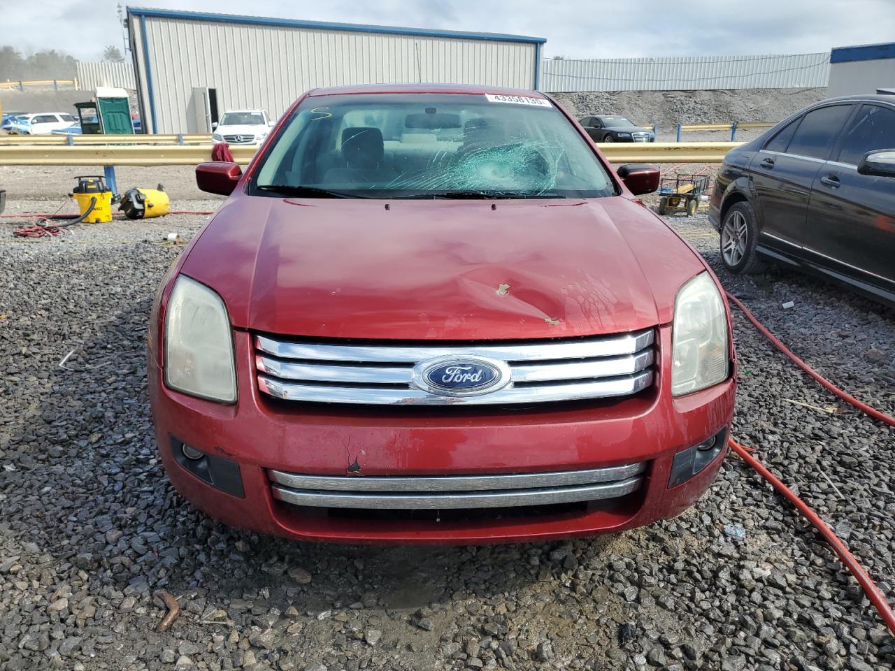 2007 Ford Fusion VIN 3FAHP07Z27R201398 Copart auction photo, front end / top/roof damage thumbnail 5