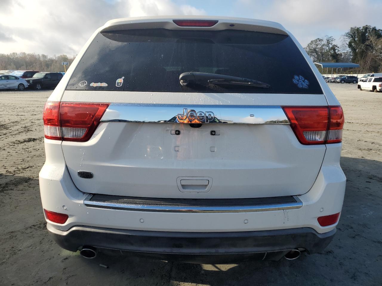 2012 Jeep Grand Cherokee VIN 1C4RJECT5CC228358 Copart auction photo, side / minor dent/scratches damage thumbnail 6