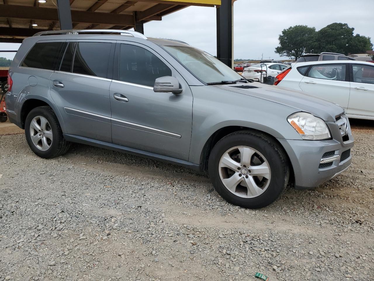 2012 Mercedes-Benz GL-klasse VIN 4JGBF7BE1CA783901 Copart auction photo, front end / side damage thumbnail 4
