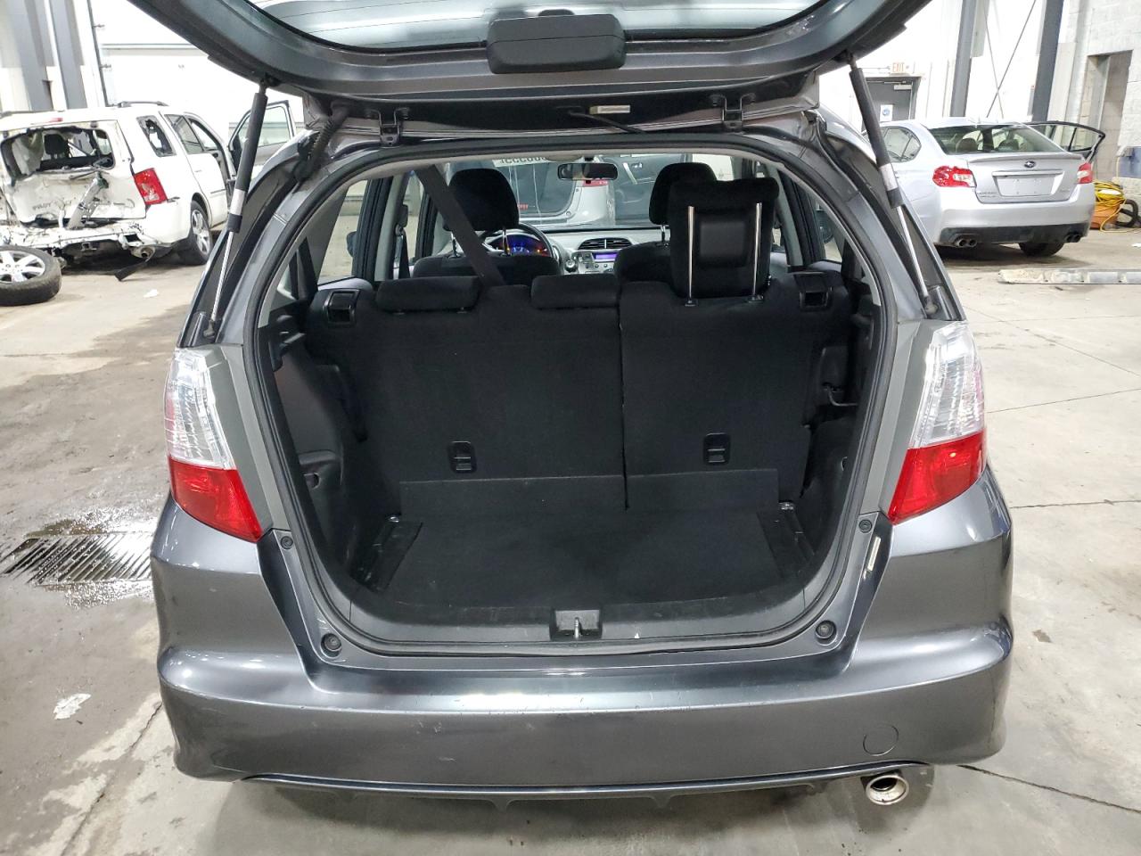 2011 Honda Fit VIN JHMGE8H57BC000186 Copart auction photo, front end damage thumbnail 6