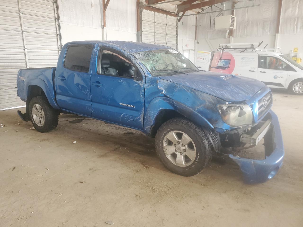 2009 Toyota Tacoma VIN 5TELU42N09Z612794 Copart auction photo, rollover / all over damage thumbnail 4