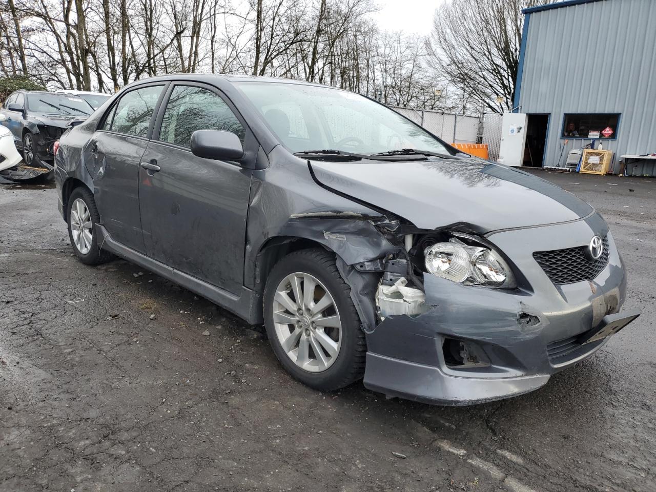 2010 Toyota Corolla VIN 2T1BU4EE9AC511528 Copart auction photo, side / front end damage thumbnail 4