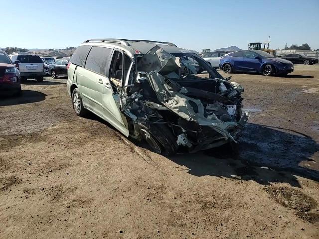 2010 Toyota Sienna VIN 5TDKK4CC6AS323144 Copart auction photo, all over damage thumbnail 11
