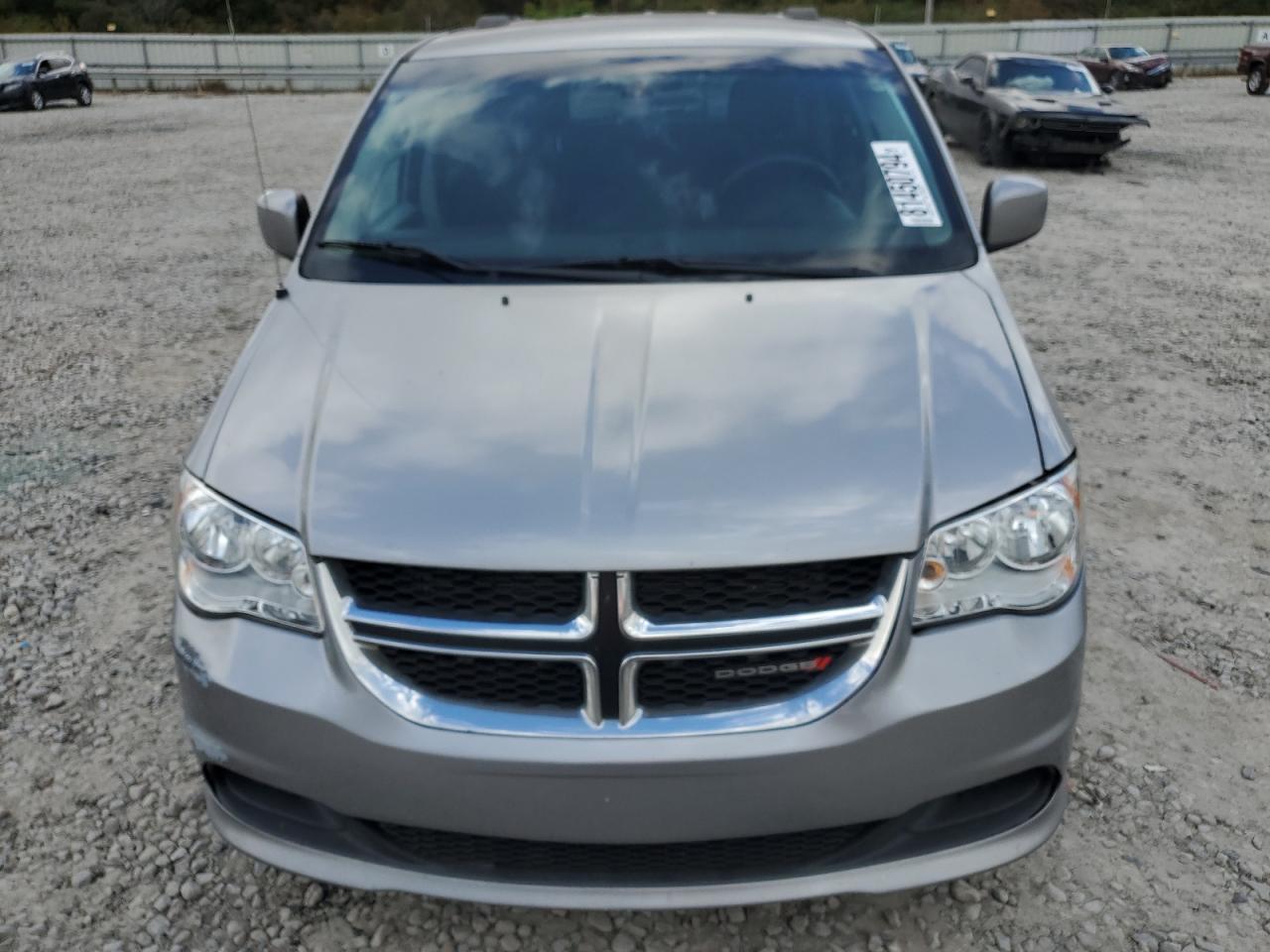 2016 Dodge Caravan VIN 2C4RDGCG5GR179407 Copart auction photo, side damage thumbnail 5