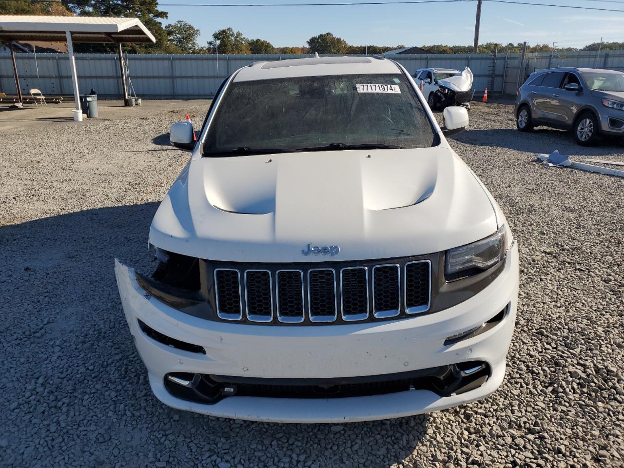 2015 Jeep Grand Cherokee VIN 1C4RJFDJ4FC625552 Copart auction photo, front end / side damage thumbnail 5
