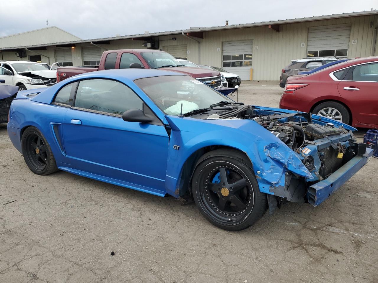 2000 Ford Mustang VIN 1FAFP42X0YF105482 Copart auction photo, front end damage thumbnail 4
