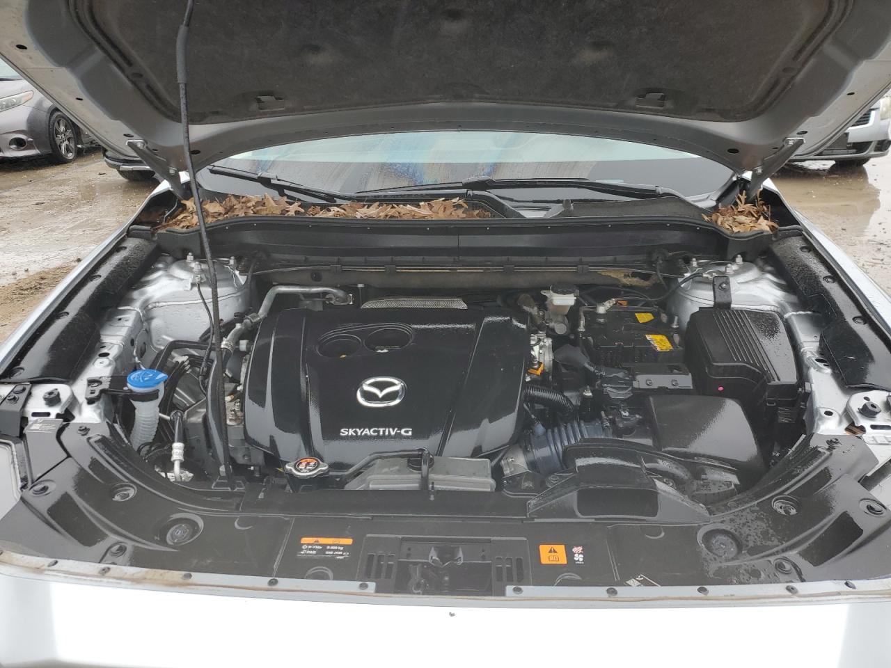 2021 Mazda CX-5 VIN JM3KFBDM4M1374618 Copart auction photo, front end / undercarriage damage thumbnail 12