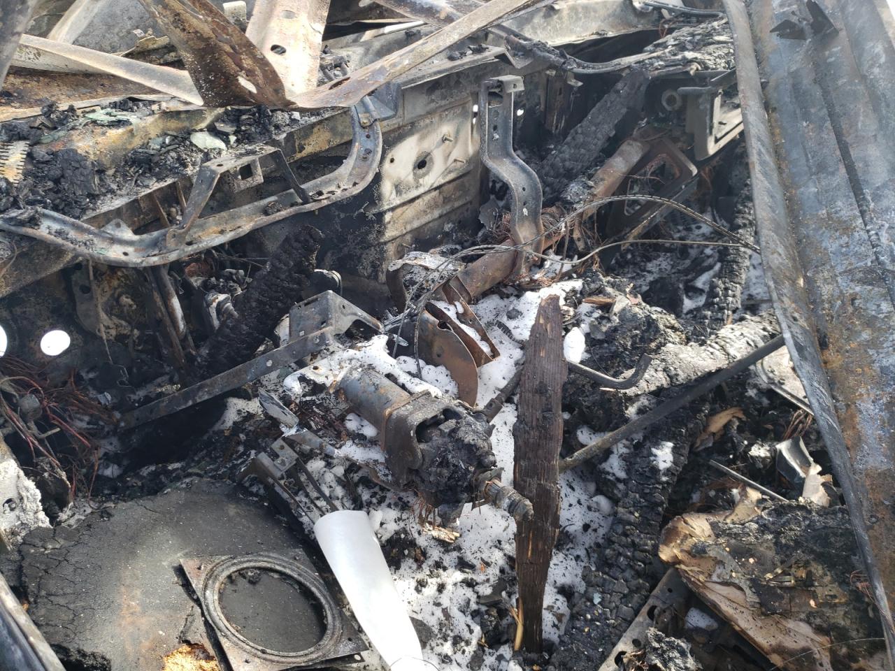 2003 Cadillac Escalade VIN 1GYEK63NX3R251600 Copart auction photo, burn damage thumbnail 9