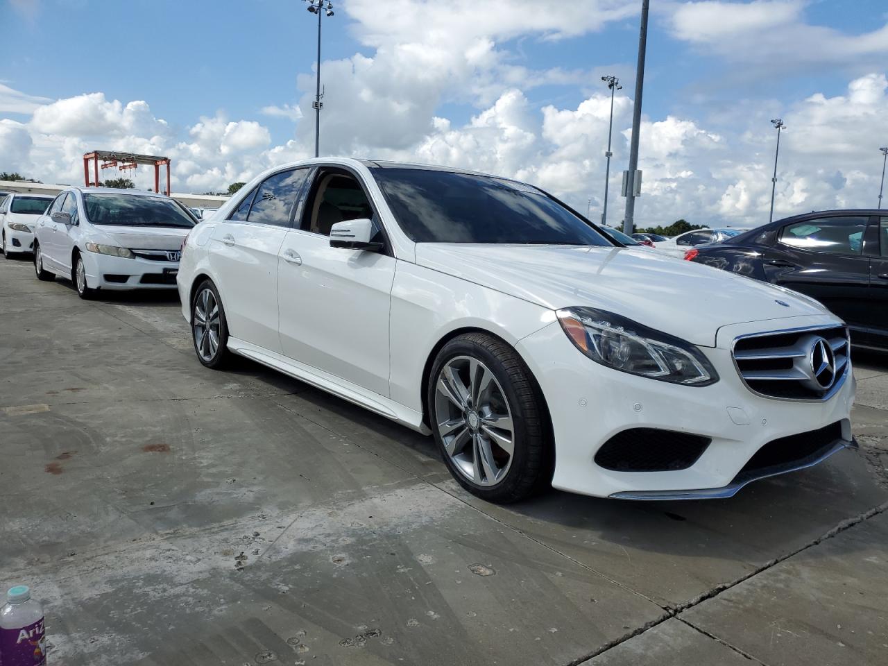 2015 Mercedes-Benz E-klasse VIN WDDHF5KBXFB141402 Copart auction photo, water/flood damage thumbnail 4