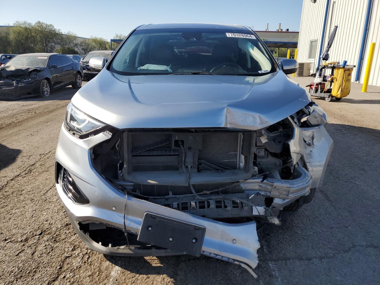 2022 Ford Edge VIN 2FMPK4K95NBA30558 Copart auction photo, front end / side damage thumbnail 5