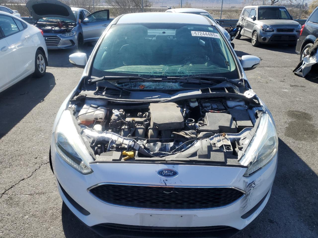 2017 Ford Focus VIN 1FADP3F22HL211238 Copart auction photo, front end / rear end damage thumbnail 5