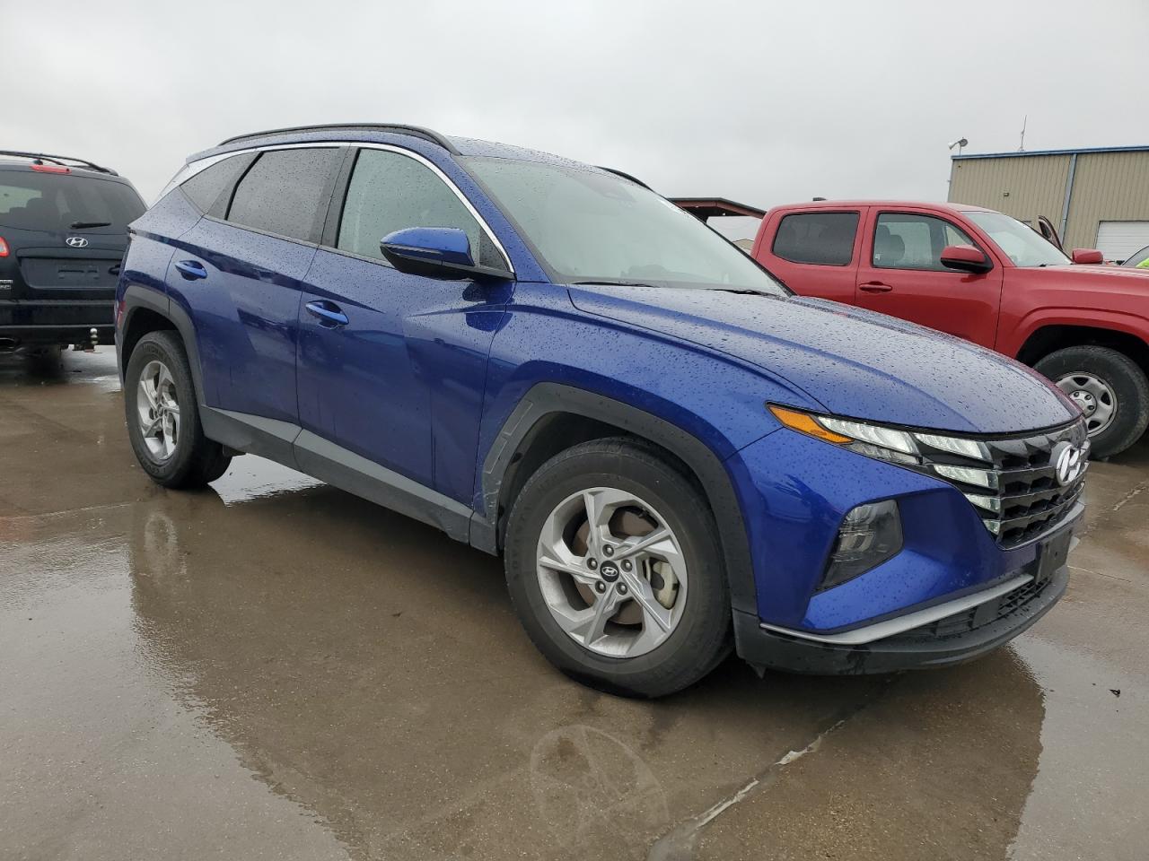 2022 Hyundai Tucson VIN 5NMJB3AE7NH077353 Copart auction photo, side / hail damage thumbnail 4